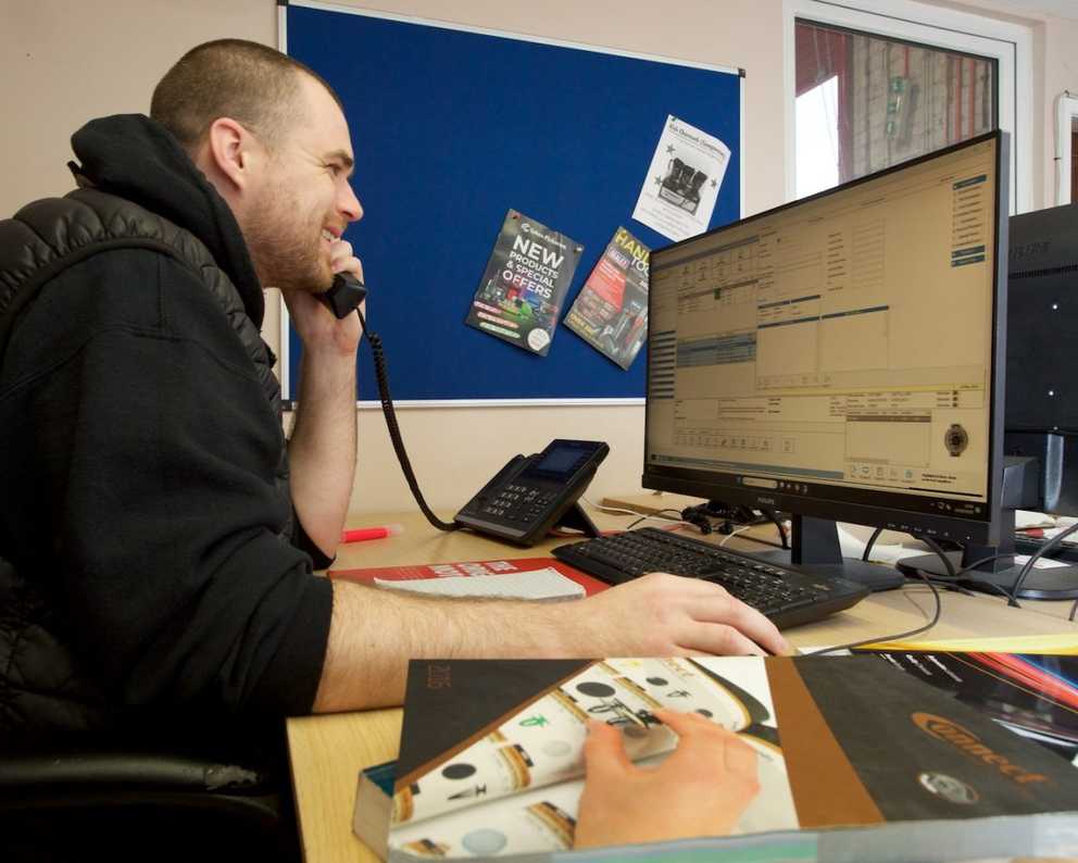 Parts specialist on the phone